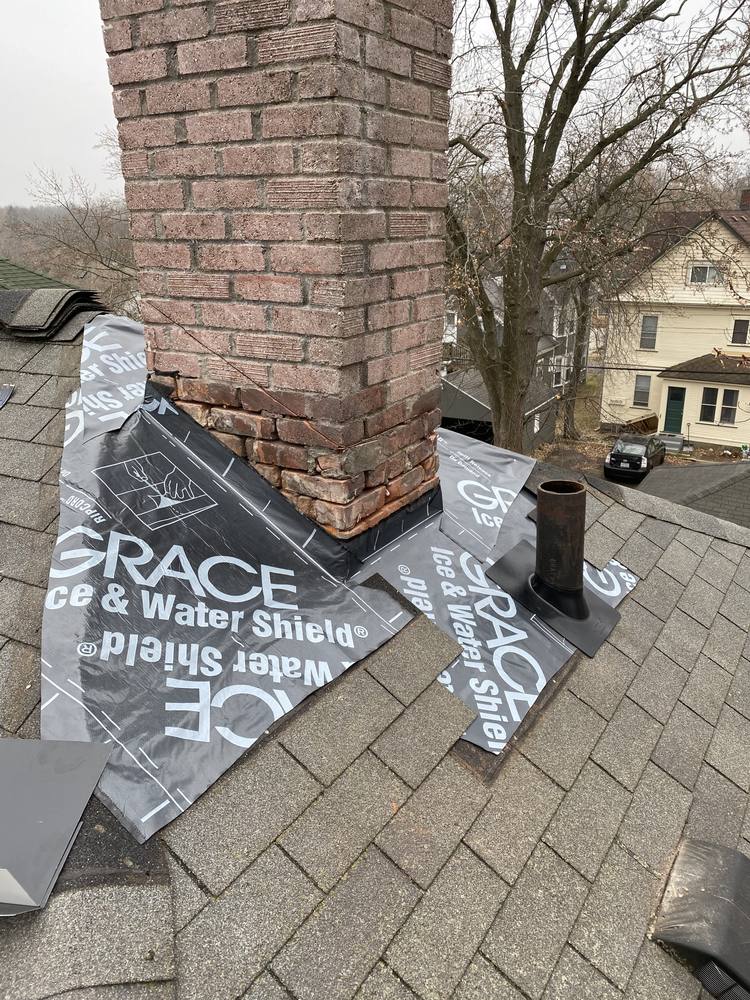 Chimney and Flue Pipe Re-Flash in West Michigan — photo 4 of 15