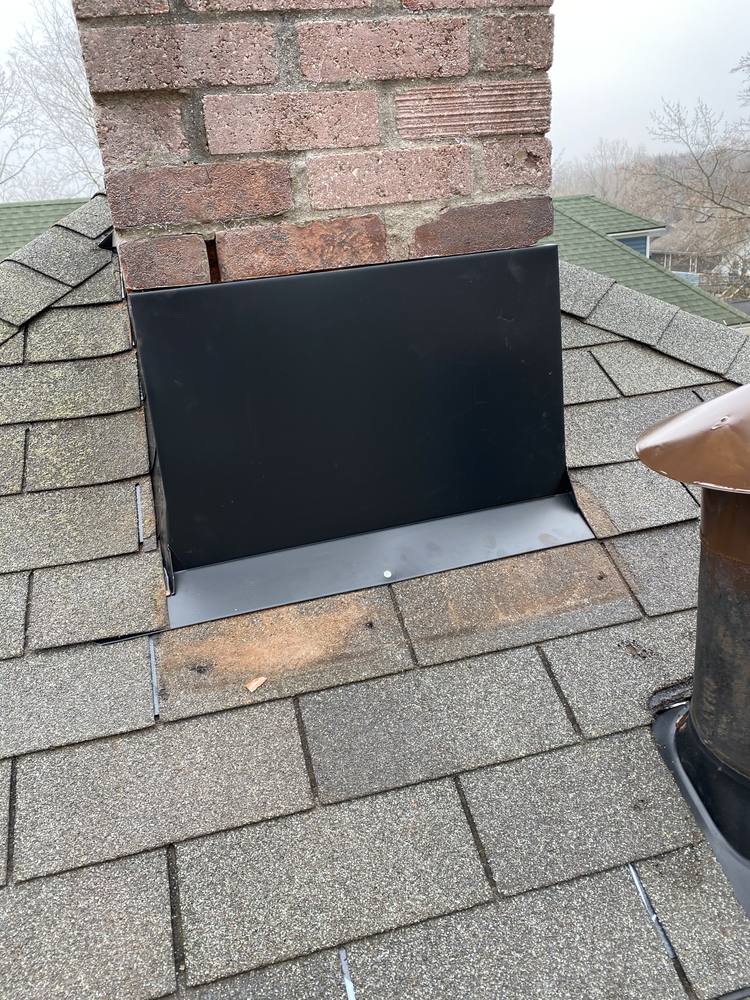 Chimney and Flue Pipe Re-Flash in West Michigan — photo 10 of 15