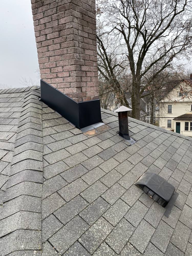 Chimney and Flue Pipe Re-Flash in West Michigan — photo 11 of 15