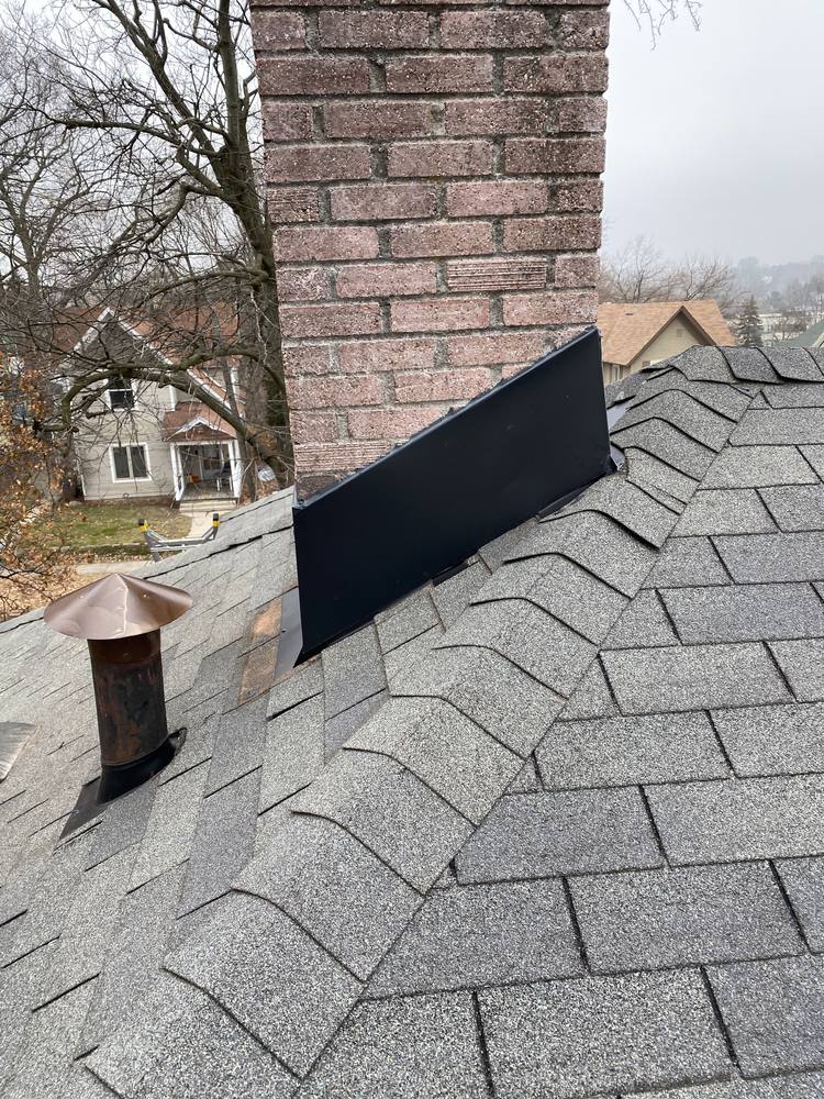 Chimney and Flue Pipe Re-Flash in West Michigan — photo 13 of 15