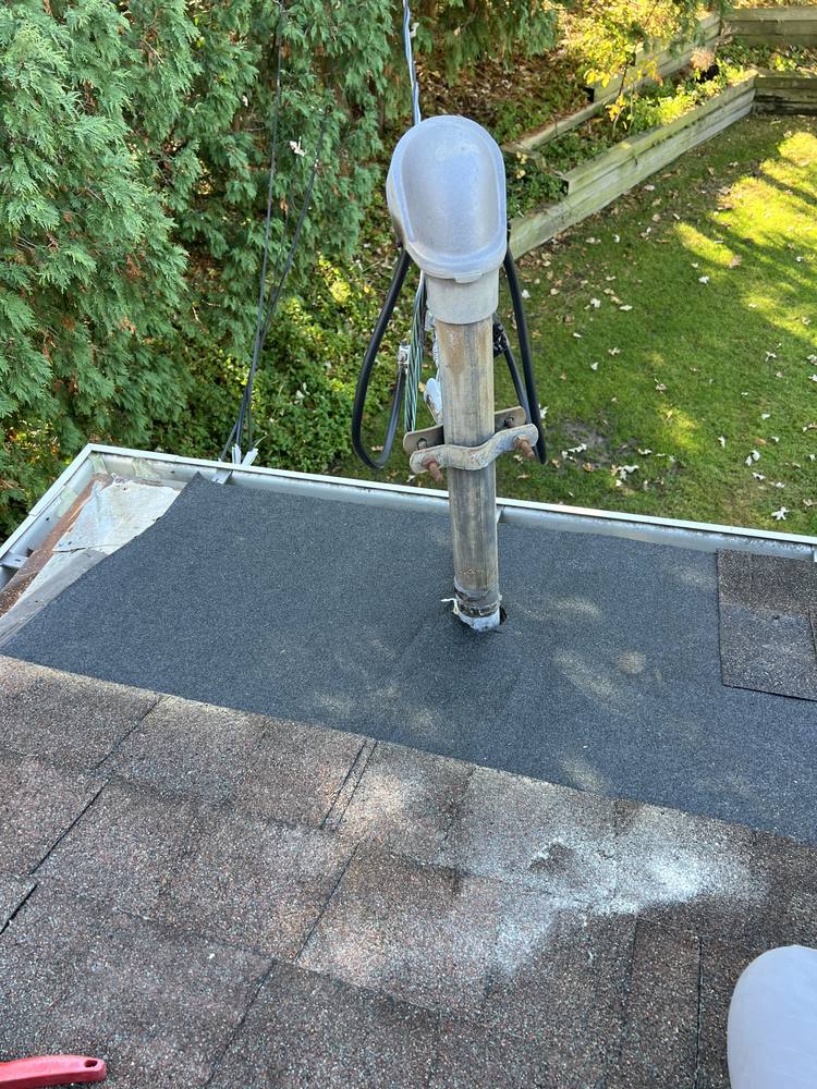 Chimney, Electrical Mast and Pipe Boots in West Michigan — photo 26 of 28