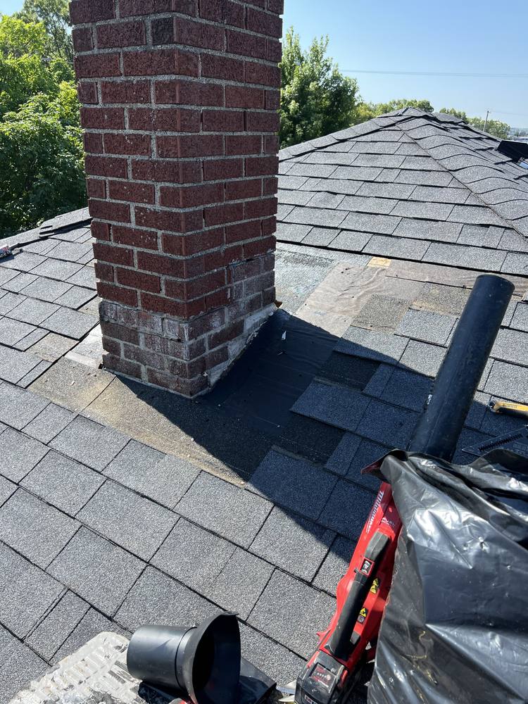 Chimney Re-Flash and Roof Vent in West Michigan — photo 10 of 15