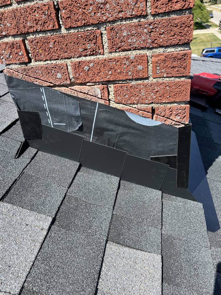 Chimney Re-Flash and Roof Vent in West Michigan — photo 13 of 15