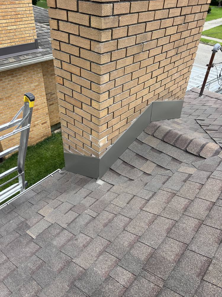 Chimney Step Flashing Repair in West Michigan — photo 11 of 12