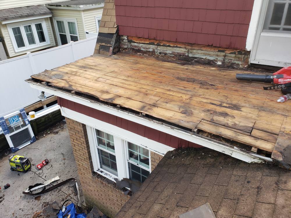 EPDM Flat Roof and Door-to-Window Conversion in West Michigan — photo 5 of 13