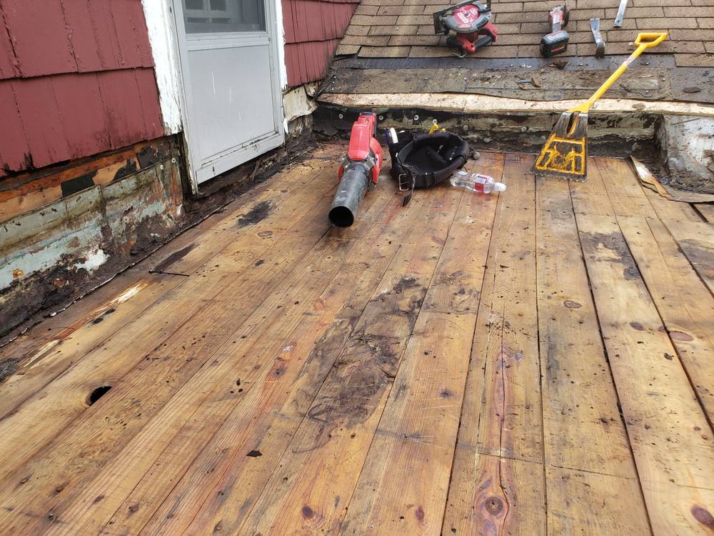 EPDM Flat Roof and Door-to-Window Conversion in West Michigan — photo 7 of 13