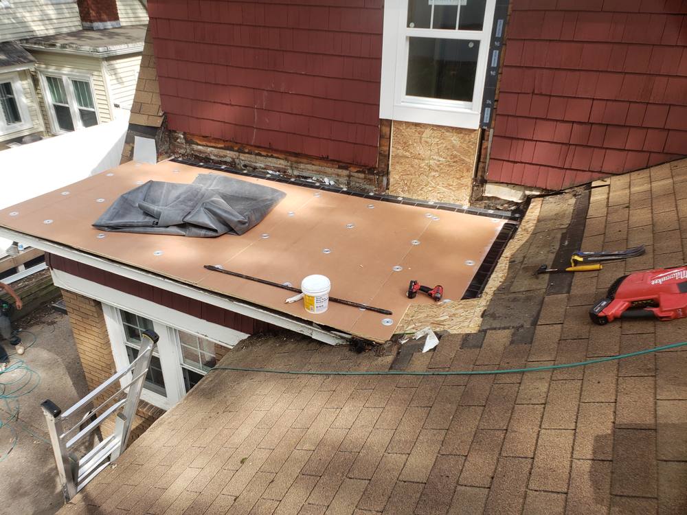 EPDM Flat Roof and Door-to-Window Conversion in West Michigan — photo 10 of 13