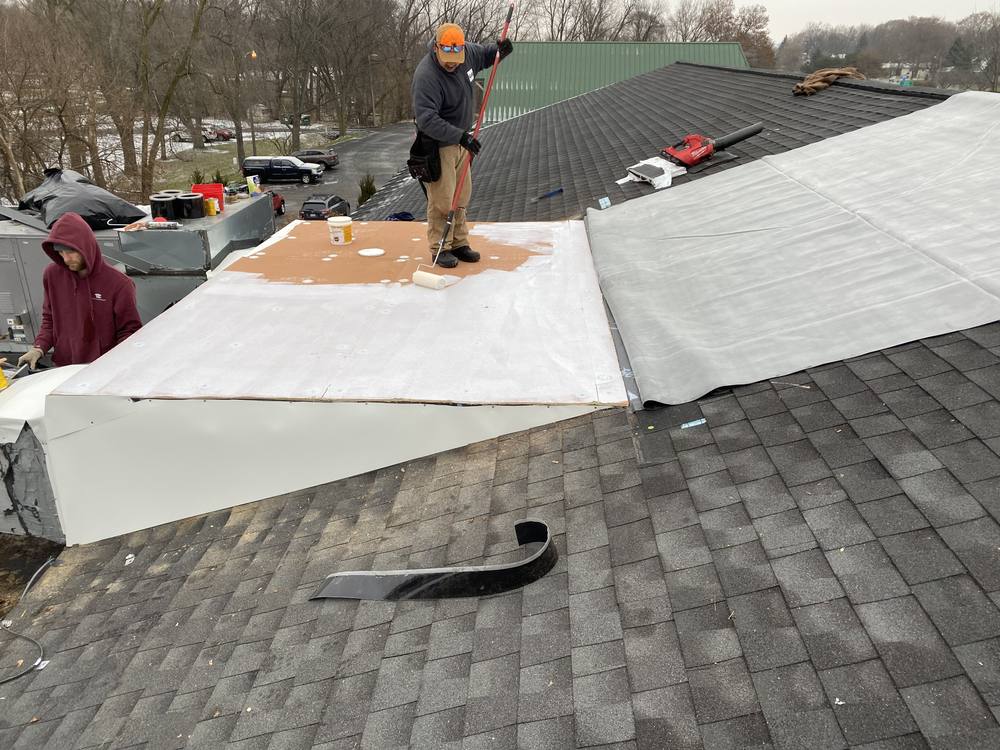 EPDM Flat Section on a Shingle Roof in West Michigan — photo 6 of 7