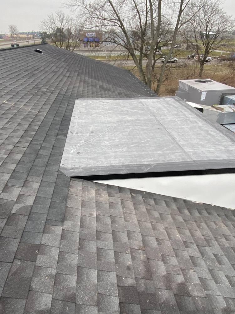 EPDM Flat Section on a Shingle Roof in West Michigan — photo 7 of 7