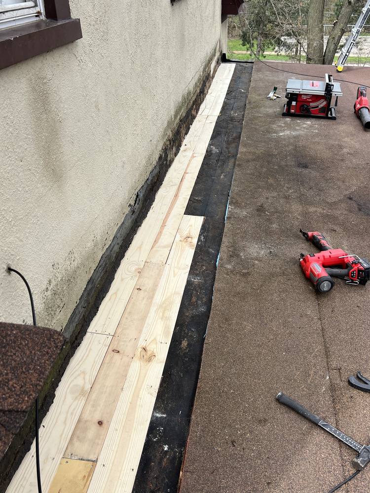 Flat Roof-to-Wall Repair in West Michigan — photo 9 of 20
