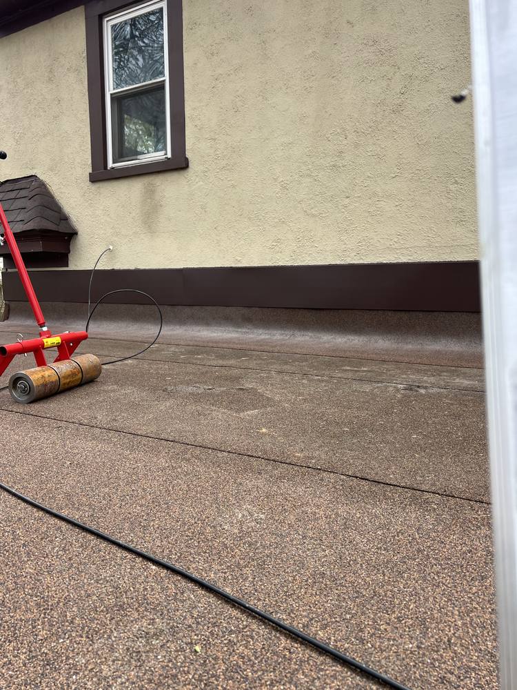 Flat Roof-to-Wall Repair in West Michigan — photo 13 of 20