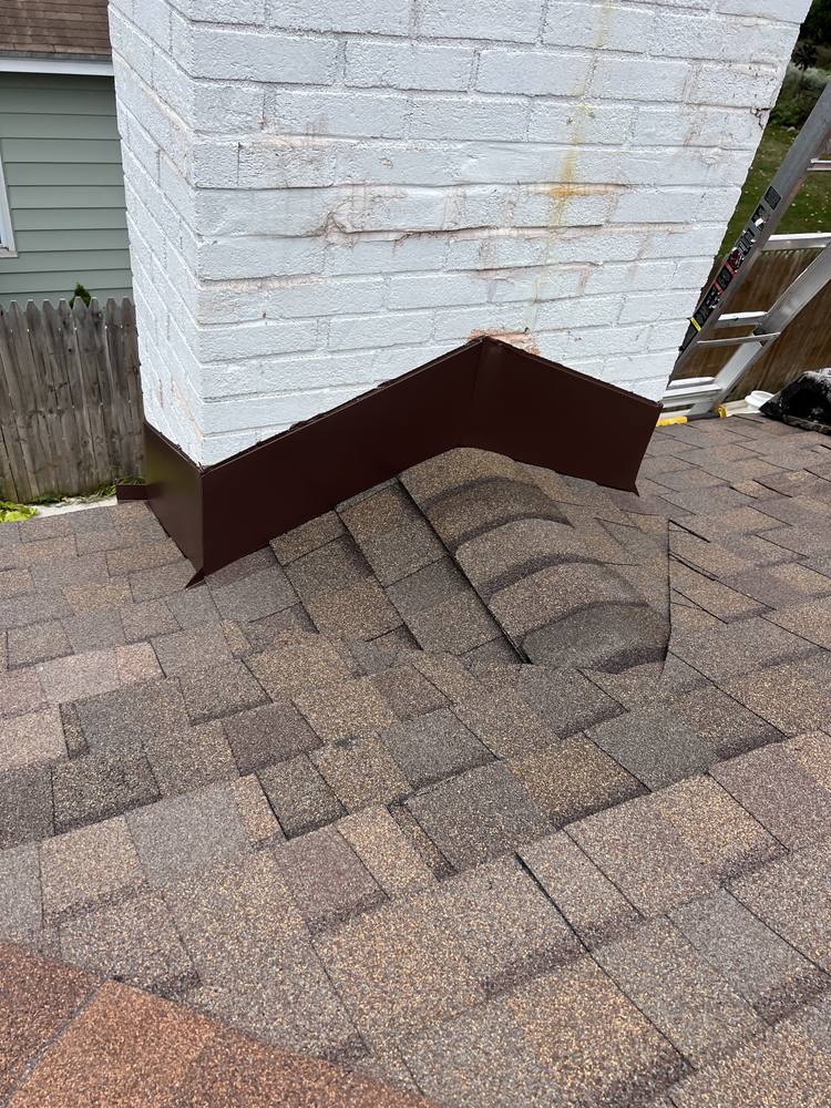 Painted Brick Chimney Re-Flash in West Michigan — photo 18 of 19