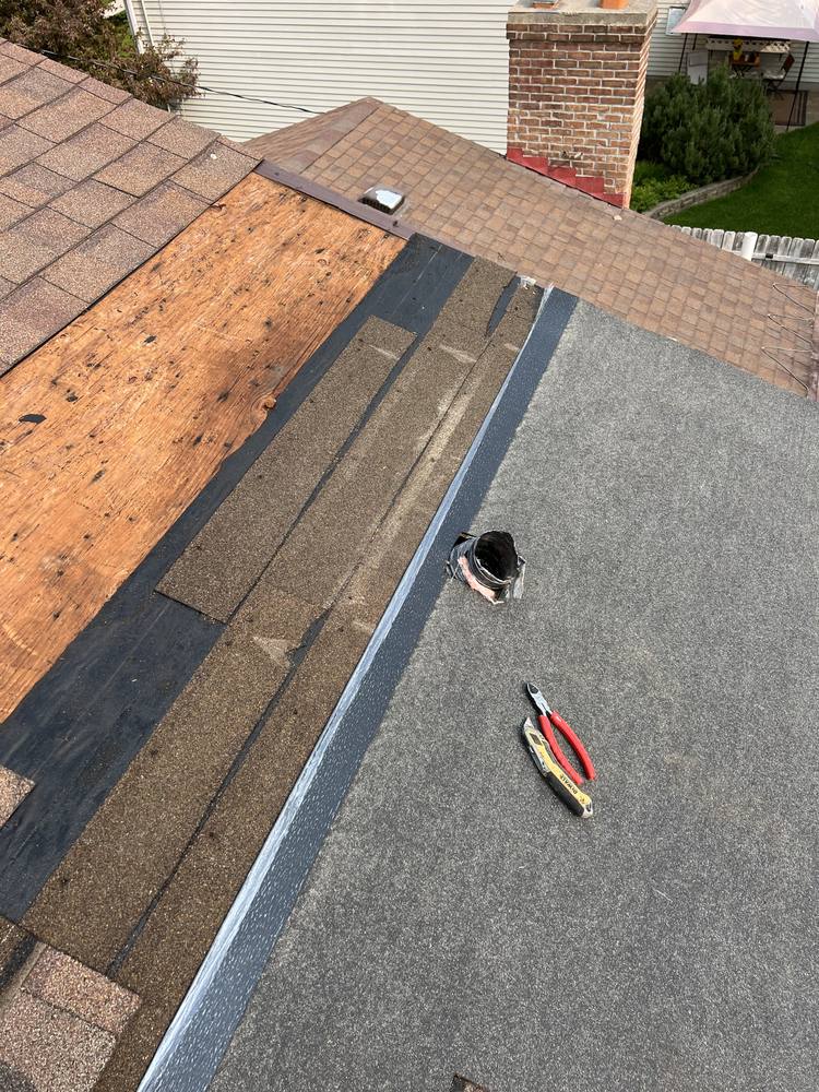 Ridge Vent and Bath Fan Vent Added in West Michigan — photo 7 of 12