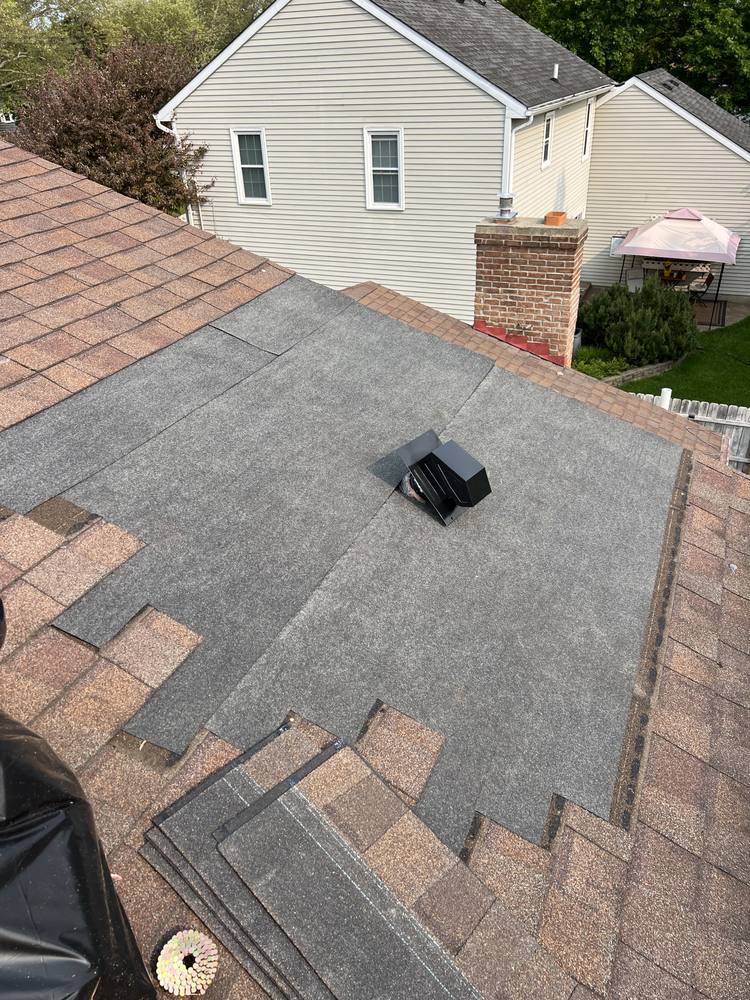 Ridge Vent and Bath Fan Vent Added in West Michigan — photo 9 of 12