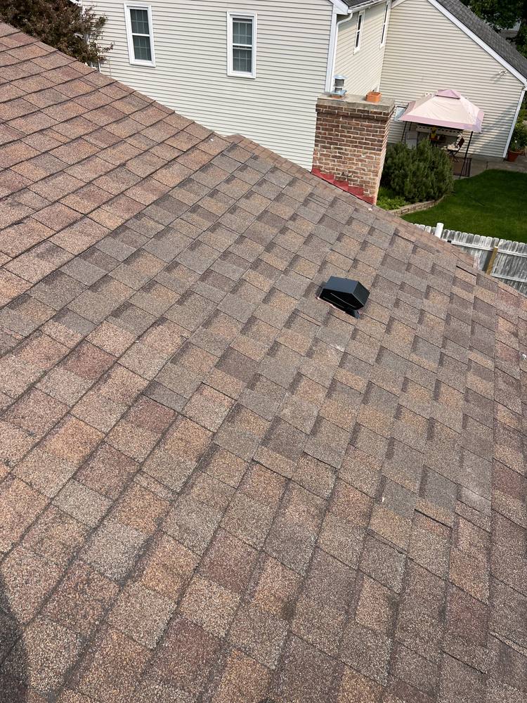 Ridge Vent and Bath Fan Vent Added in West Michigan — photo 11 of 12