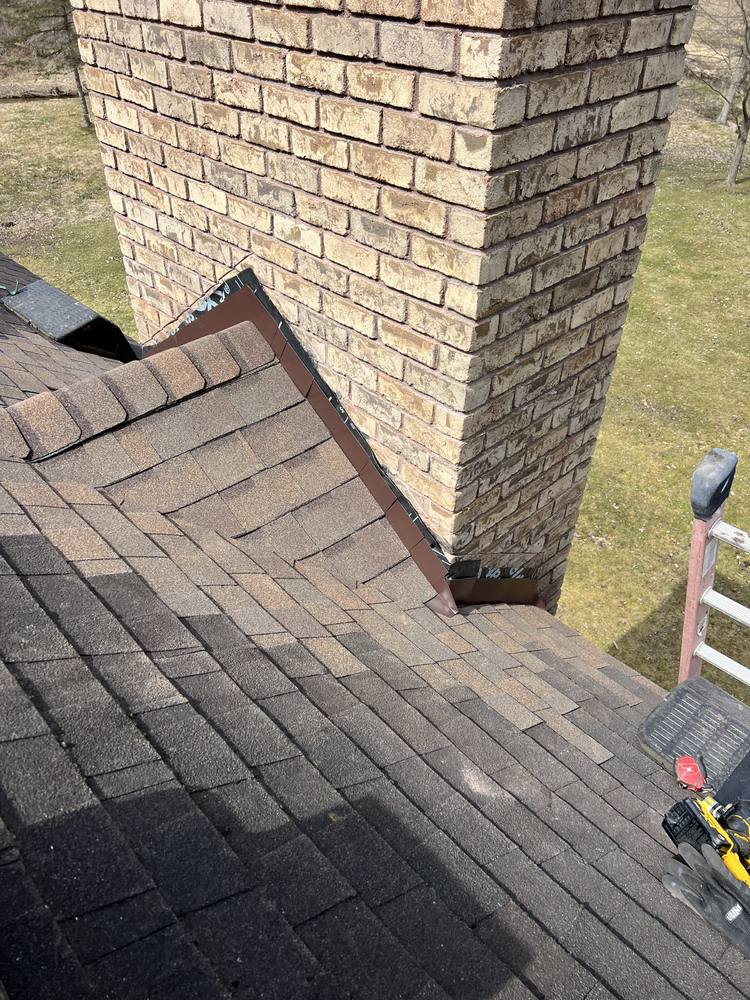 Stone Chimney Re-Flash in West Michigan — photo 19 of 22