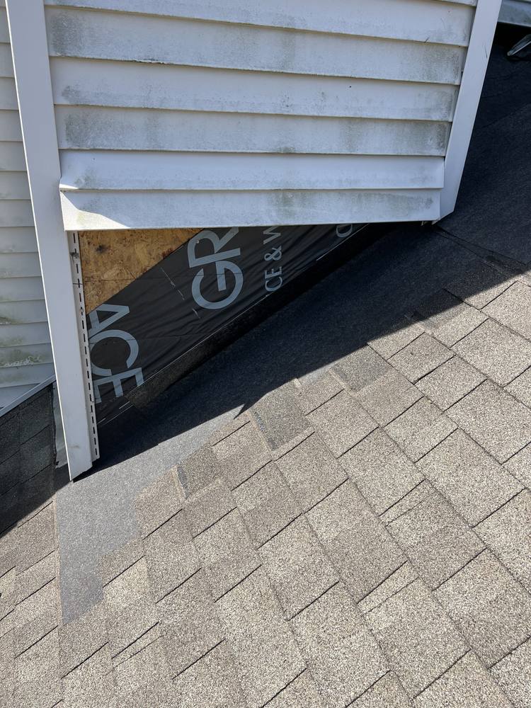 Vinyl-Sided Chimney Flashing in West Michigan — photo 7 of 16