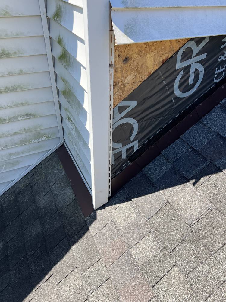 Vinyl-Sided Chimney Flashing in West Michigan — photo 12 of 16